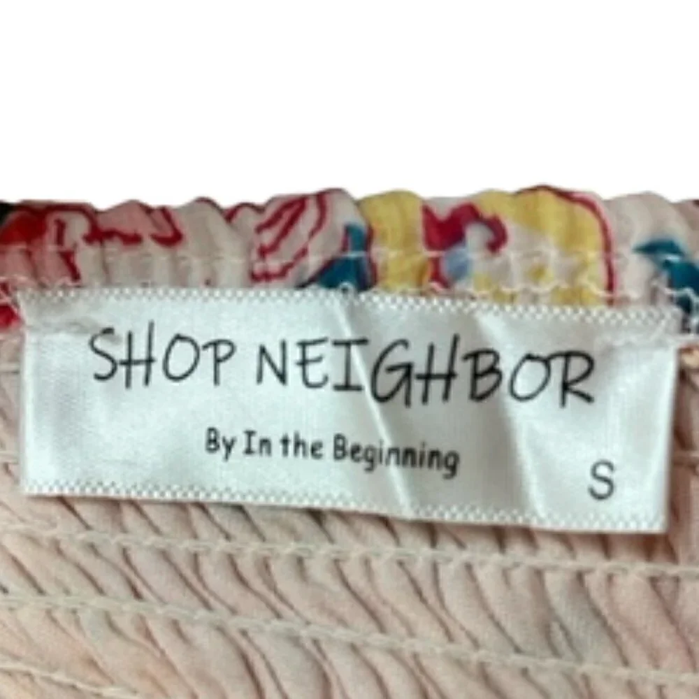 Shop Neighbor by In the Beginning Floral Smocked Ruffle Mini Skirt – Size Small